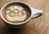 Чашка кофе с олимпийскими кольцами