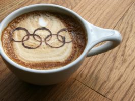 Чашка кофе с олимпийскими кольцами